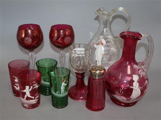 Four Mary Gregory glasses, two jugs and a sugar sifter